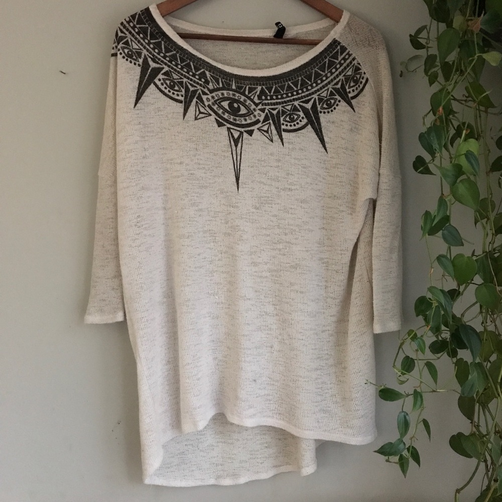 white eye pattern tunic top